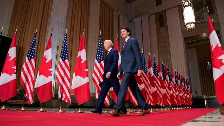 President Joe Biden and Canadian Prime Minister Justin Trudeau arrive for a news conference Friday, March 24, 2023, in Ottawa, Canada. 