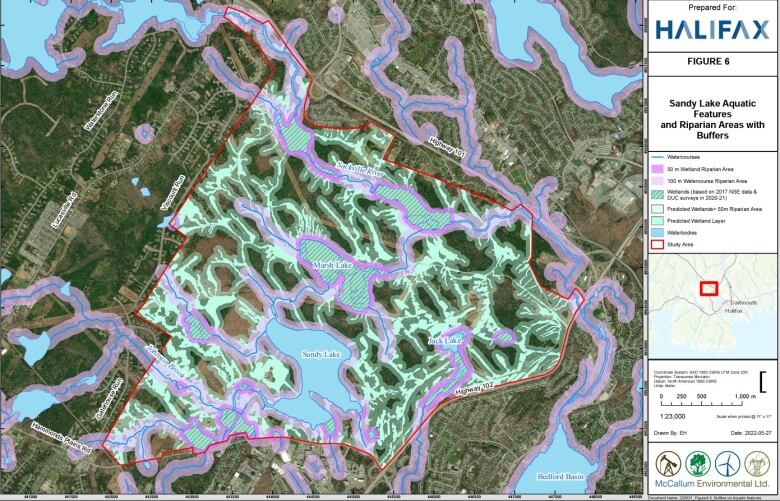 A map of Sandy Lake shows pink and turqouise buffer zones colouring most of the area with small pockets of green showing through.