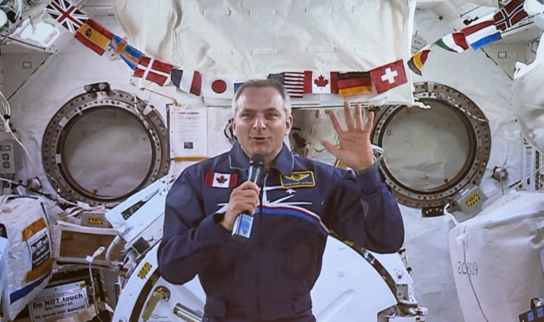 A photograph of astronaut David Saint-Jacques in the International Space Station