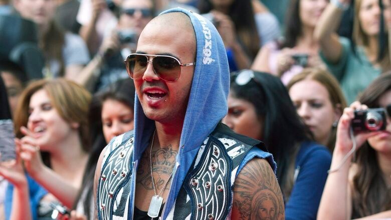 Danny Fernandes arrives on the red carpet during the 2011 MuchMusic Video Awards in Toronto on Sunday, June 19, 2011. 