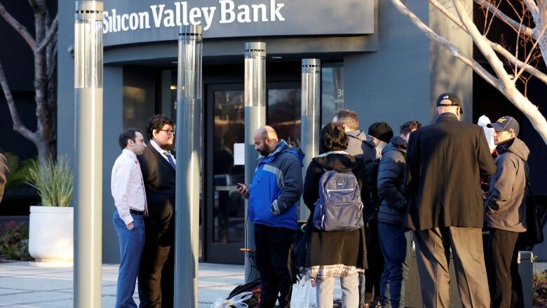 People line up in front of Silicon Valley Bank. 