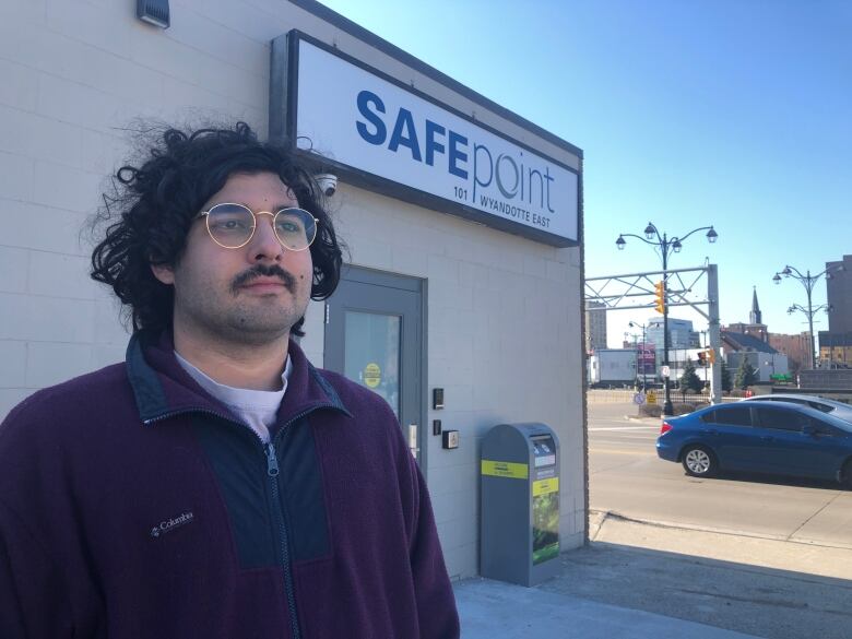 Bilal Nasser of the Save the Windsor CTS group stands outside the Safepoint Consumption and Treatment Site.