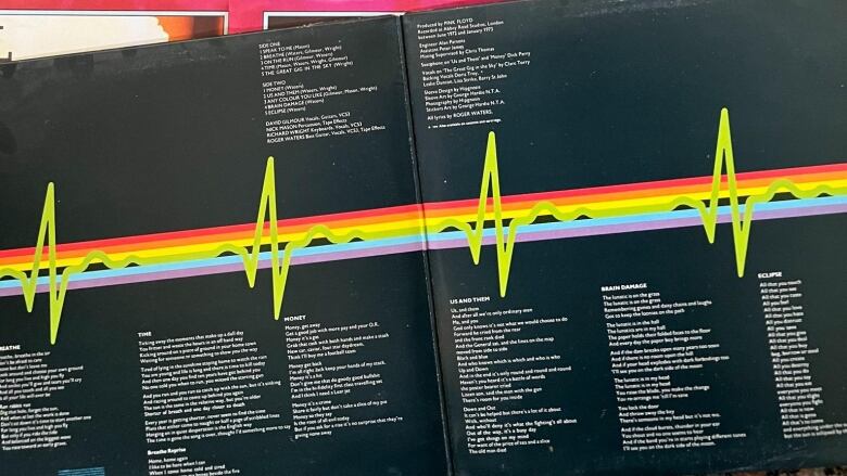 Three posters from Pink Floyd's Dark Side of the Moon are s