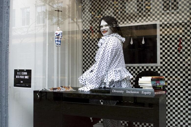 A clown sitting on a desk for Diversity Inclusion Equity.