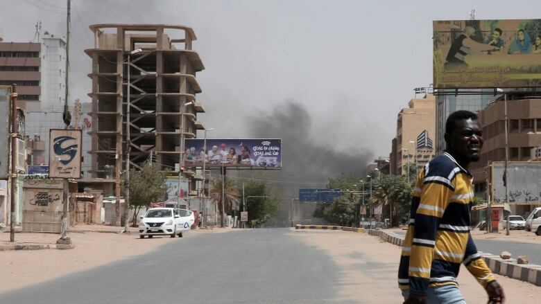 Smoke rises over the city of Khartoum.