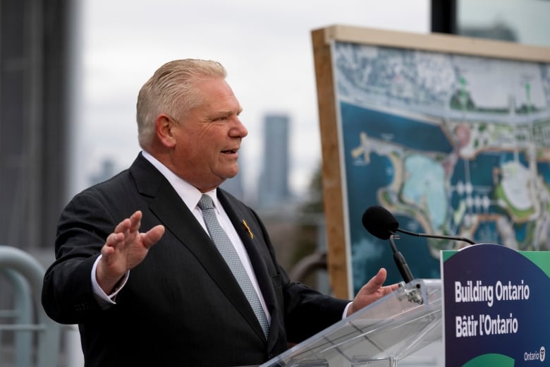 Premier Doug Ford stands at a podium at Ontario Place.