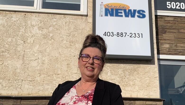 Barb Pettie, regional publisher of the Sylvan Lake News, is pictured outside her office in Sylvan Lake.