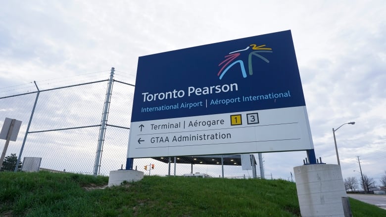 A sign for Toronto Pearson International Airport is pictured in Mississauga, Ont., on Thursday, April 20, 2023.