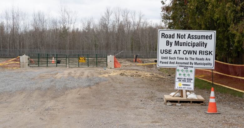 A construction site with a sign.