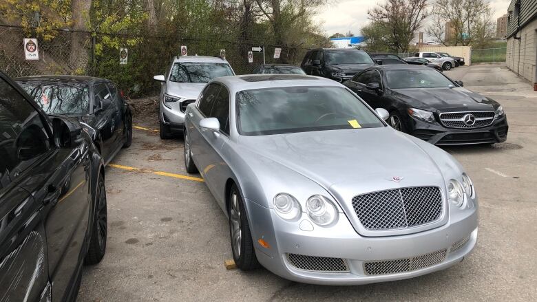 Cars in a parking lot.