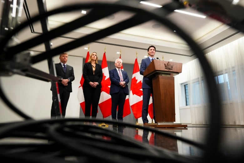 Prime Minister Justin Trudeau speaks at a podium.