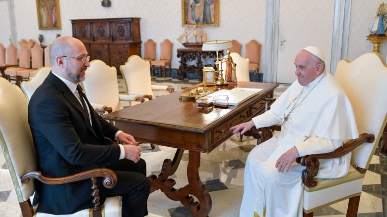 Ukraine's Prime Minister Denys Shmyhal, left, meets with Pope Francis at the Vatican on April 27, 2023.