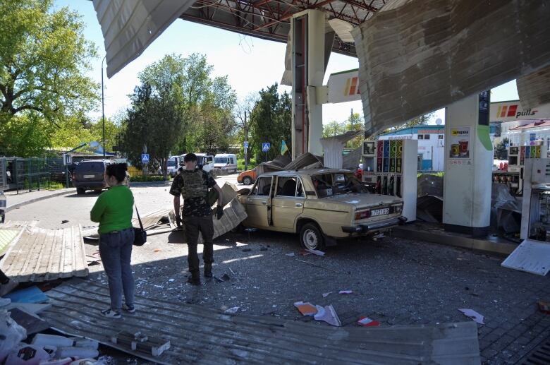 A gas station damaged by a Russian military strike, in Kherson, Ukraine.