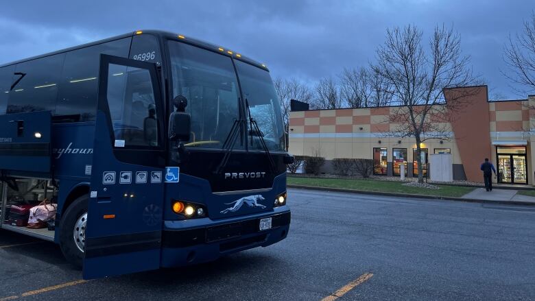 The Greyhound bus heading to New York City picks up passengers at the Mountain Mart bus stop in Plattsburgh in late April. 