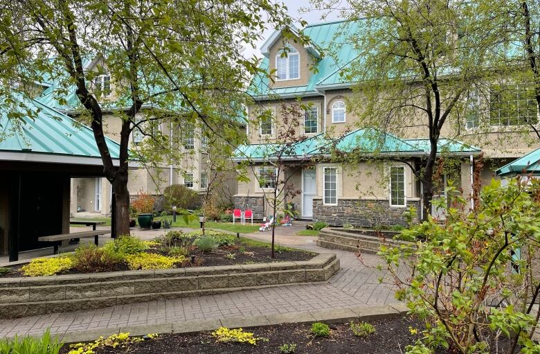 The courtyard of the River Run townhouse complex is shown.