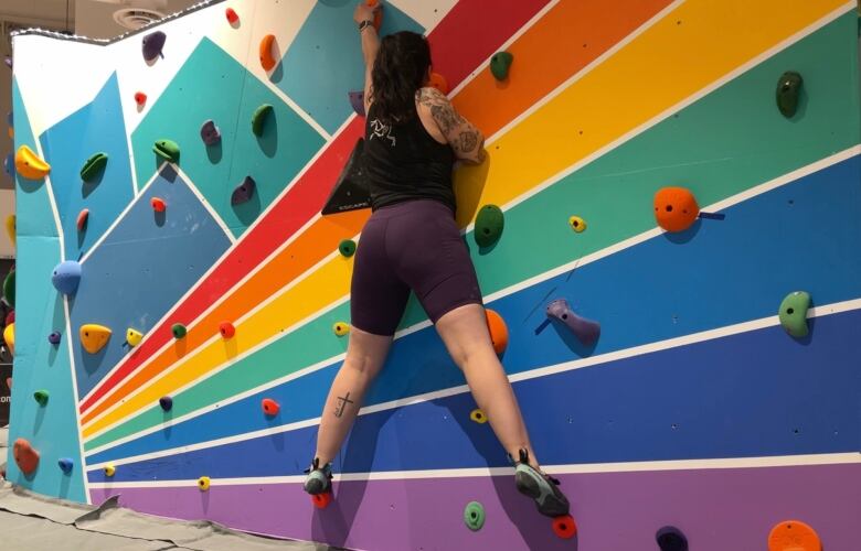 A climber tries out the new faculty at the Centre for Newcomers.