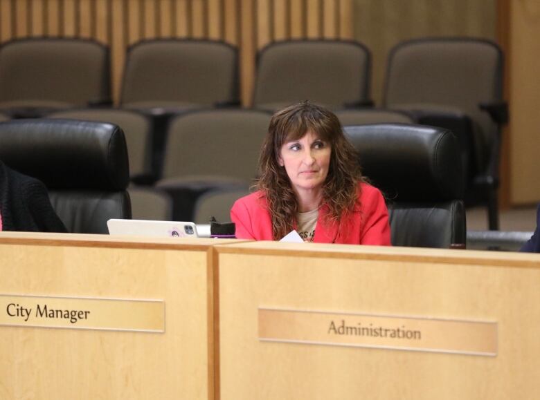 Regina city manager Niki Anderson observes a meeting of city council. 