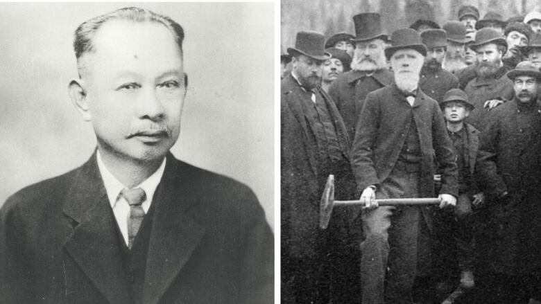 A vintage black and white photo of a man in a suit on the left and a man holding a hammer with a crowd behind him near a railway track. 