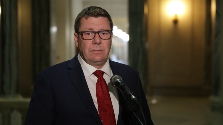 Premier Scott Moe speaks with media at the Saskatchewan legislature on May 15, 2023. 