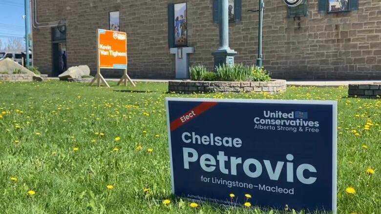 Dueling lawn signs dot the public parks in Pincher Creek ahead of the May 29 provincial election.