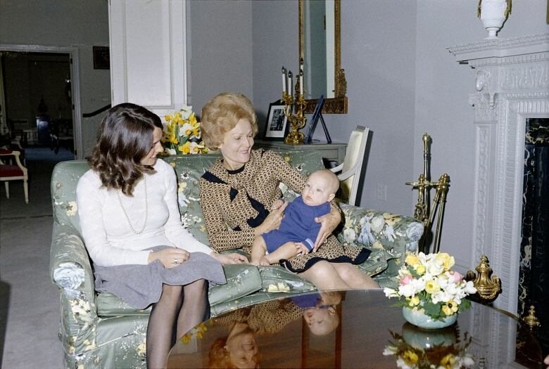 Pat Nixon, the wife of former president Richard Nixon, is seen holding an infant Justin Trudeau.