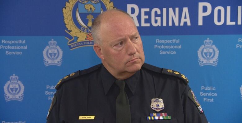 A white bald male in a police uniform is pictured. 