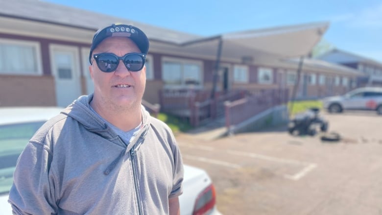 Homer Blacquiere stand infront of his home of the last sic years, a former motel in Alberton.