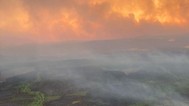 a helicopter shot of the fires in Lac Mistissini