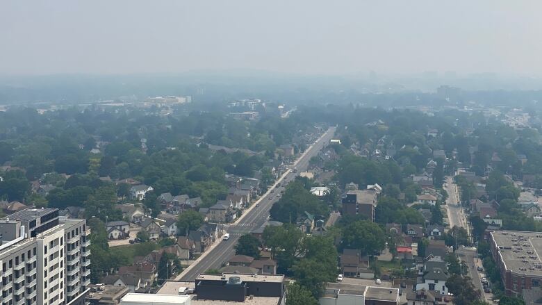 Wildfire smoke creates hazy conditions in downtown Kitchener.