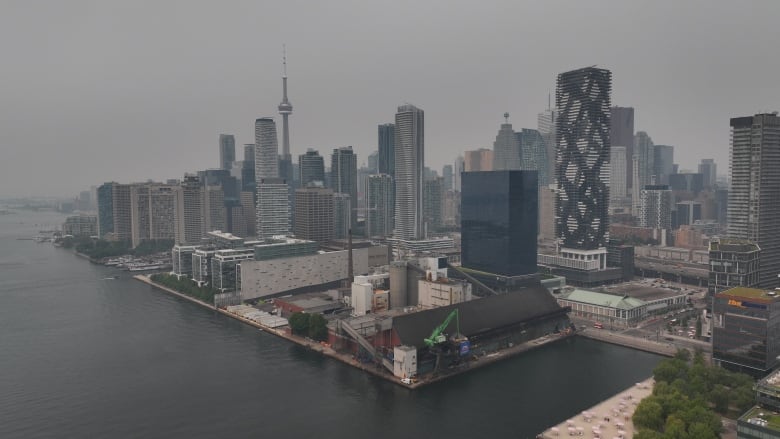 A drone captures a shot of Toronto's smoky skyline from the harbour, as Quebec's out-of-control wildfires bring days of haze. 