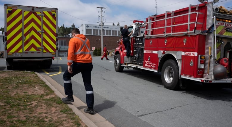 Firefighters and other emergency responders work at a staged command centre outside of Halifax. Climate change may lead to longer and more intense fire seasons in the region. 