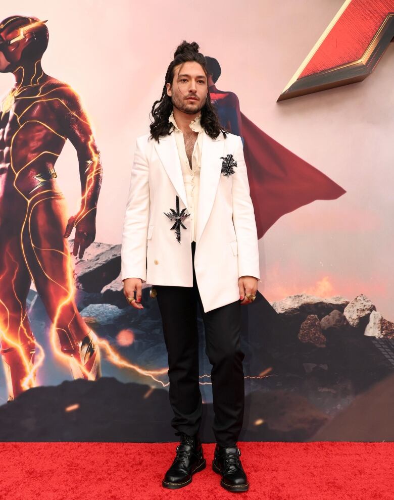 Ezra Miller on the red carpet premiere for The Flash. 