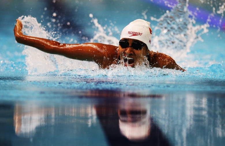 Roxon of Canada competes in the heats of the Women's 100m Butterfly S9 during Day Five of The IPC Swimming World Championships in Glasgow, Scotland.