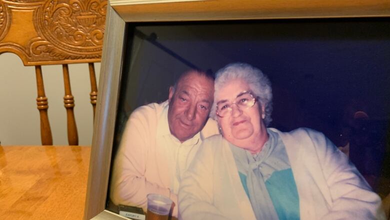 A framed family photo of Alice Martin and husband Laurence. 