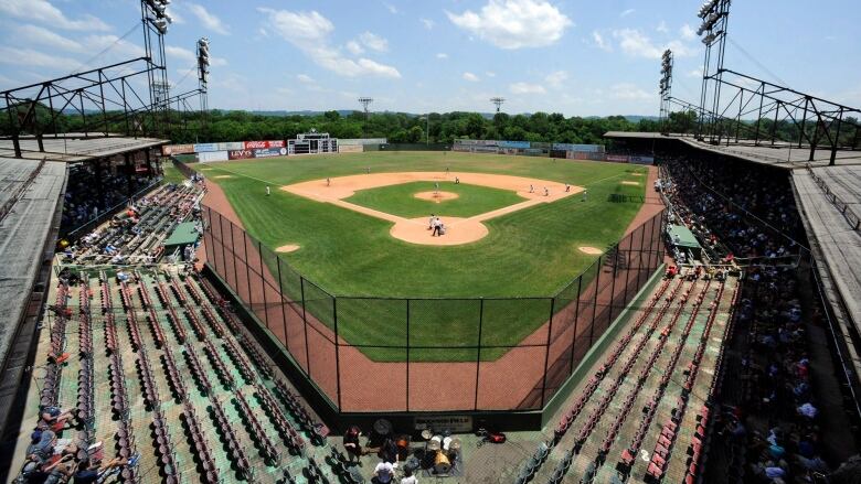 A baseball ball park is seen from above,