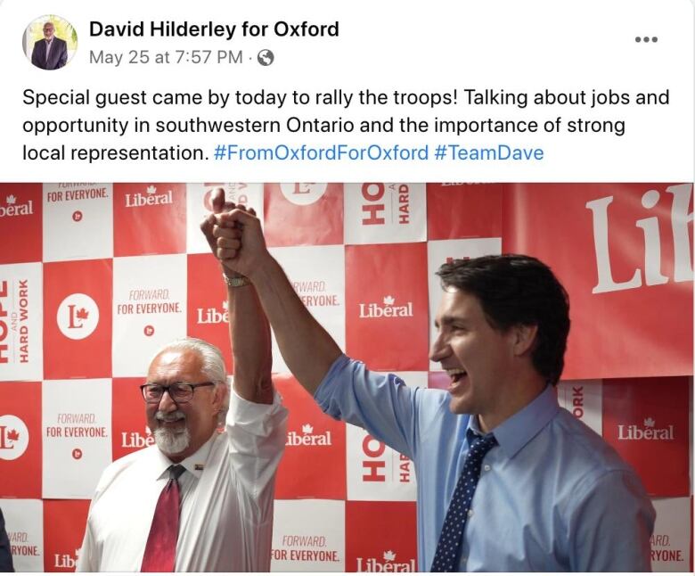 Liberal candidate David Hilderley is seen holding Prime Minister Justin Trudeau's hand during a campaign event.