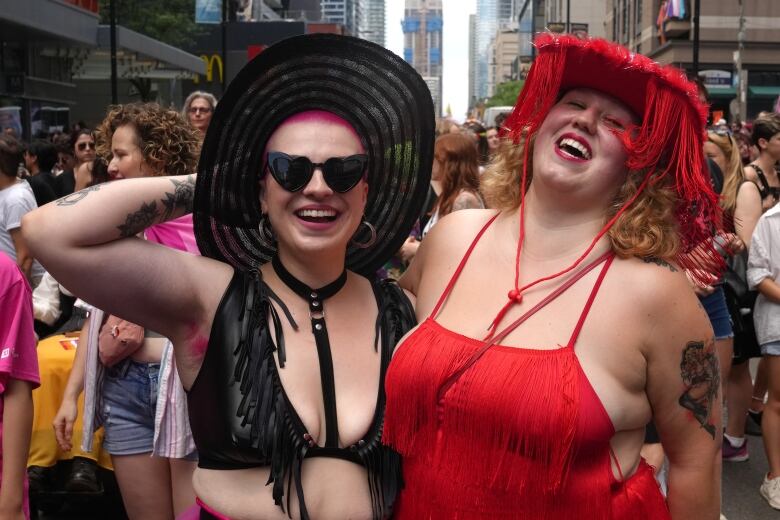 Participants walk in the Dyke Parade, on Saturday June 24, 2023, as part of Pride Celebrations in Toronto.