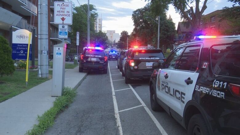 Police cars on a street. 