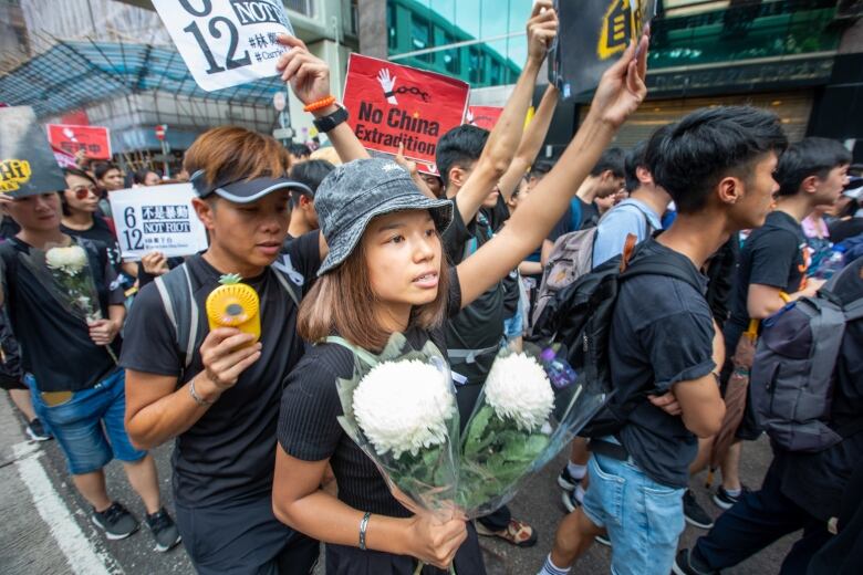 People protest on the street.