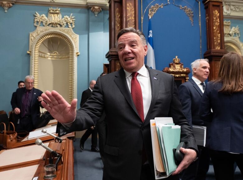 Quebec Premier Franois Legault walks in for question period.