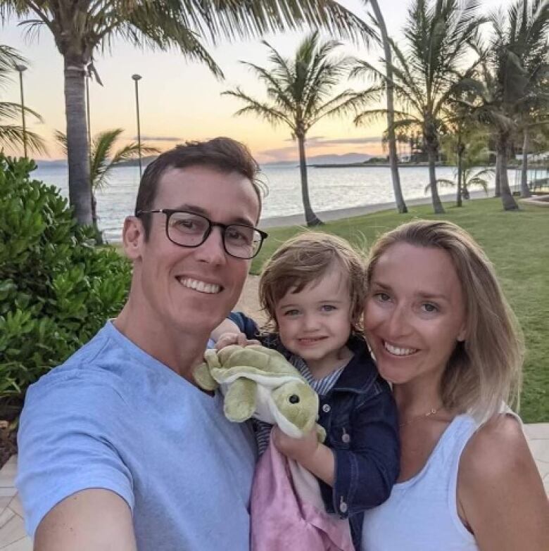 Dr. Stephanie DeMarchi is pictured on a beach with her family.