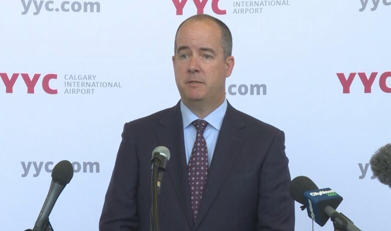 Chris Miles, the vice president of operations and infrastructure for the Calgary Airport Authority, speaks to reporters at June 28, 2023, to explain the cause of an outage a day earlier. 