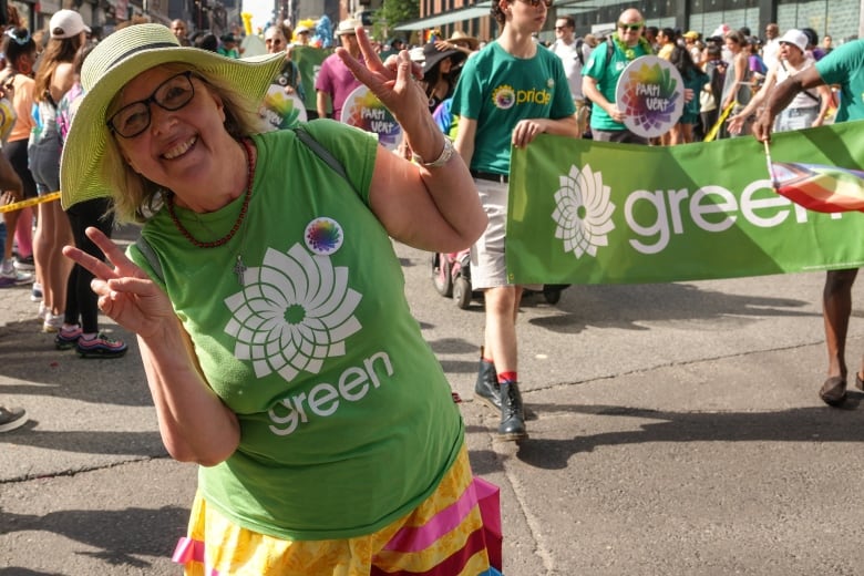 Green Party Leader Elizabeth May is seen walking in Toronto's Pride parade.