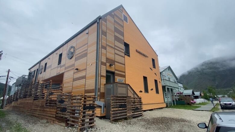 The exterior of a giant brown building