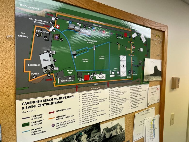 A bulletin board shows a mapped out view of the Cavendish Beach Music Festival grounds.