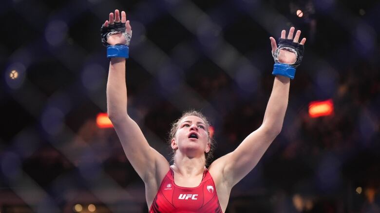 Jasmine Jasudavicius celebrates after her fight against Miranda Maverick during a UFC 289 women's flyweight bout, in Vancouver, on Saturday, June 10, 2023.