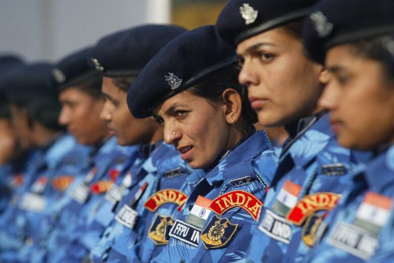 Indian female soldiers belonging to the 103 Battalion of the Rapid Action Force, attend a function before their departure to Liberia as a part of the United Nations peacekeeping forces in New Delhi, India, Thursday, Jan. 18, 2007. The group is the first all women team from India to undertake a United Nations peacekeeping assignment. 