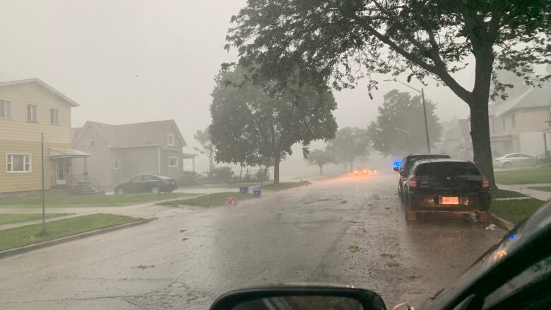 A photo from a car of rain