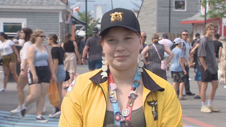 Emma Bear, dressed in her team manitoba gear, tells her story thursday afternoon along the waterfront in downtown halifax