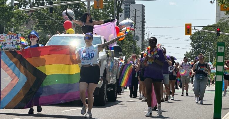 The parade included appearances by drag queens and other entertainers, and was supported by local businesses and institutions as well as the city itself.